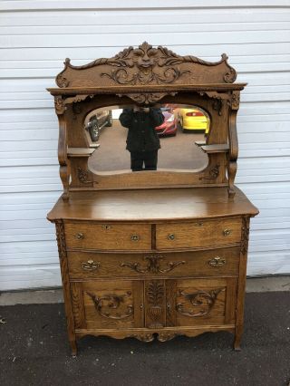 Antique Victorian Oak Sideboard / Buffet With Ornate Carvings With Face