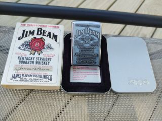 Vintage 1998 Jim Beam Raised Medallion Zippo Lighter In Tin W/sleeve.