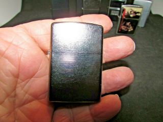 Group of 6 vintage Zippo Lighters - one with red seal 2