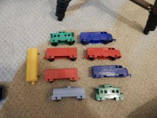Vintage Americana.  Plastic Toy Trains And Train Cars
