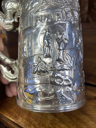 A large quality 19th century Chinese carved silver mug 5