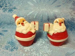 Vintage Holt Howard Santa With A Gift Salt And Pepper Shakers