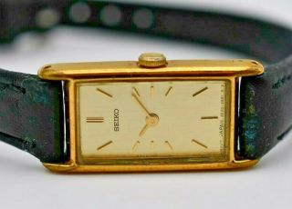 Women ' s Vintage SEIKO Gold Tone Black Leather Dress Watch,  Quartz,  2E20 - 6129 3