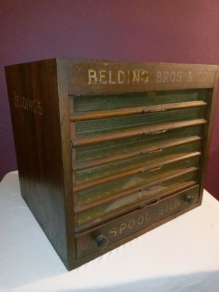 Antique Beldings Silk 7 Drawer Oak Glass Front Spool Chest Cabinet