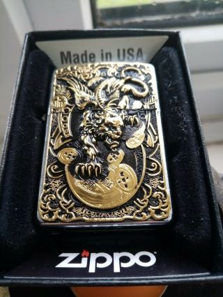 Vintage Golden devil zippo dated X comes with none matching unfired insert XIII 3