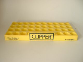 Old Clipper Lighter Plastic Yellow Display Stand Tray