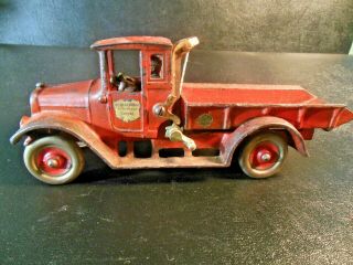 Antique Arcade Cast Iron International Harvester Red Baby Dump Truck.