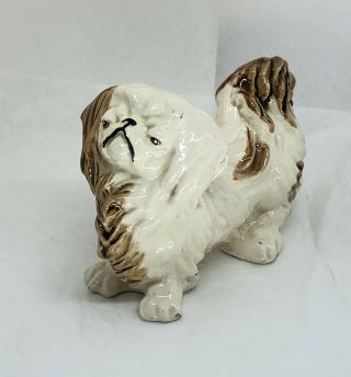 Vintage White and Brown Pekingese Dog Ceramic Figurine Hand Painted Piece 5.  5” 2
