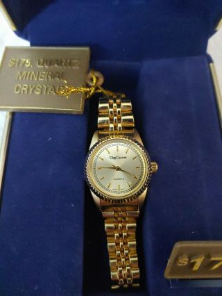 Oleg Cassini Ladies Quartz Mineral Crystal Gold Tone Watch