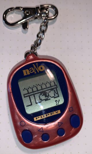 Vintage 1997 Nano Puppy Virtual Pet On Keychain Playmates Toys