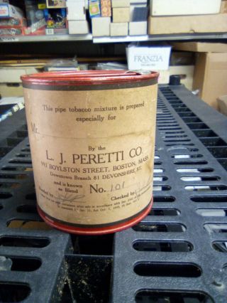 Vintage L.  J.  Peretti Company Tobacco Can