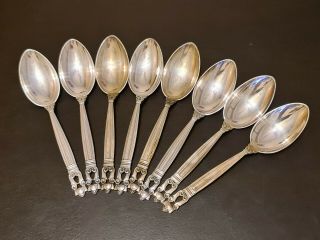 A Set Of 8 Denmark Georg Jensen Sterling Silver Acorn Pattern Spoons