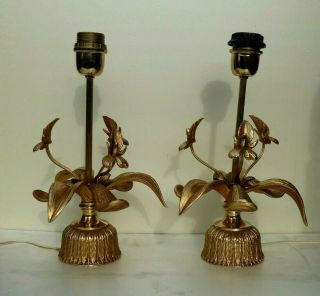 A Mid Century Regency Hollywood Maison Jansen Style Gilded Bronze Lamps