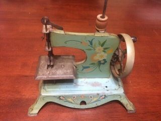 Vintage Antique 6 " High Mini Metal Toy Sewing Machine,  Lindstrom,  Made In Usa.