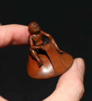 Antique Japanese Carved Netsuke Of A Fisherman Signed Bukou,  19th Century,  Fine.