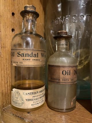 2 Antique Labeled Eastern Drug Co Boston Pharmacy Bottles Sandalwood & Nut Megs