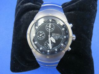Seiko Snd419 Wrist Watch For Men Titanium Case With A Titanium Bracelet.