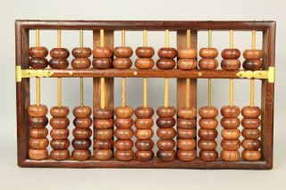 A Chinese ' Lotus - Flower Brand ' wood abacus Huanghuali? 20thc 2