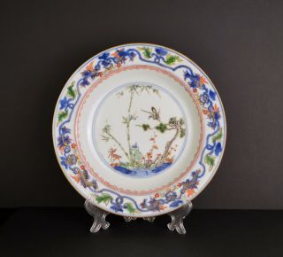 A Kangxi Period Chinese Porcelain Famille Verte Dish With Deer And Crane