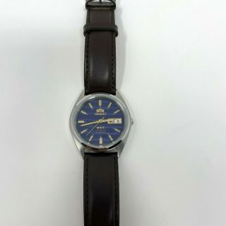 Orient Tri Star Automatic Blue Dial Gold Accents Unisex Watch