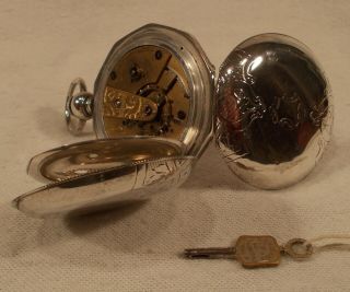 Antique American (waltham) Watch Co.  Key Wind Coin Silver Pocket Watch & Key
