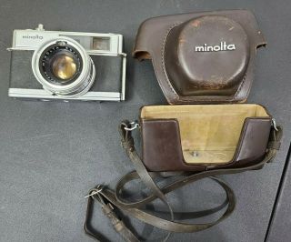 Vintage Minolta Hi - Matic 7 Camera With Rokker Pf1:1.  8 F=45mm Len And Case