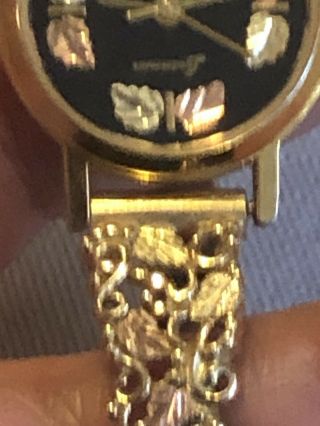 Landstroms Black Hills Gold Watch - 10k gold side bands,  leaf tri - color design 2