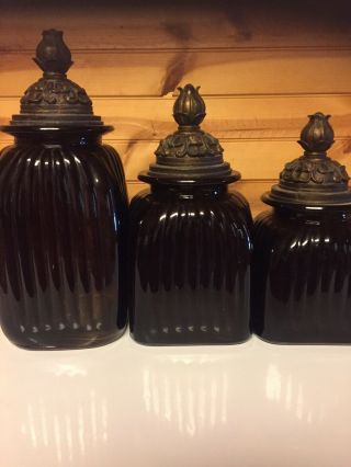 Vintage 3 Piece Glass Cannister Set In Dark Amber