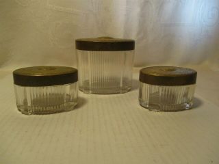 Vintage Oval Shaped Clear Glass Vanity Jars With Brass Repoused Lids / 3 Jars