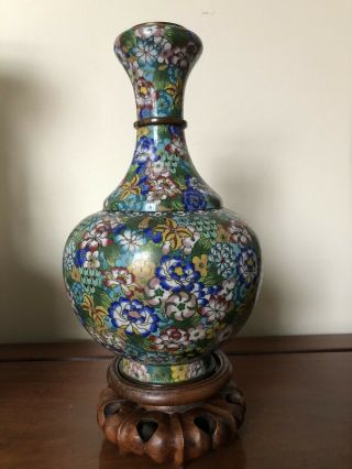 A Chinese antique vase with a wooden stand,  19th Century 2