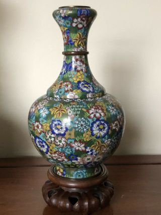 A Chinese antique vase with a wooden stand,  19th Century 3