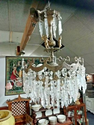 Antique French Chandelier In Gilt Bronze With Crystal Pendants And Angels