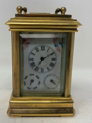 A Multi Dial Miniature Carriage Clock With Sevres Style Panels