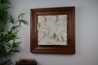 Antique 19th Century Painted Plaster Framed Plaque Of Fighting Cherubs In Relief