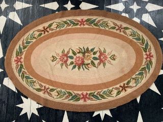 Antique Early American Oval Hooked Rug With Flower Design