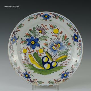 Large Dutch Delft Polychrome Charger,  Flowers,  18th Century.