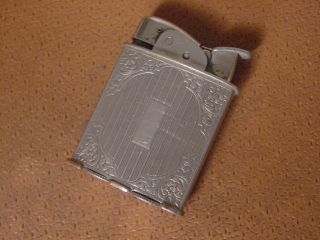 Vintage Evans Pocket Lighter.
