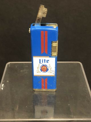 Vintage 70’s Collectible Miller Lite Beer Advertising Lift Arm Lighter.