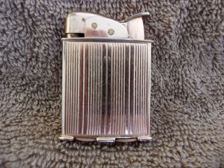 Vintage Evans Pocket Lighter, .  Pat.  19023 Exp.  1952