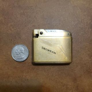 Vintage Ronson Adonis Flat Gold Tone Lighter Engraved Snowman Sandman