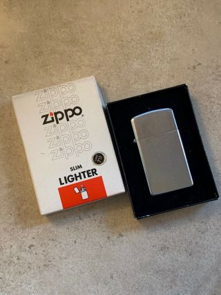 Vintage Zippo Slim 1982 Silver Tone Lighter No.  1610 W/box