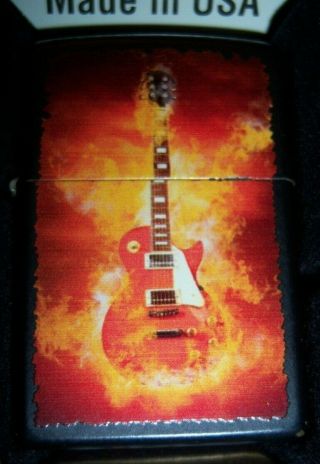 2013 Zippo Black Matte Lighter 218 Flaming Rock Guitar -