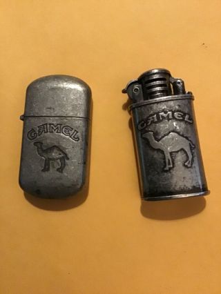 2 Vintage Camel Cigarette Lighters.  Both