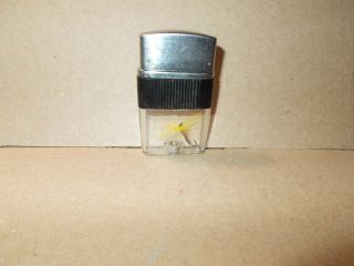 Vintage Vu Lighter With A Fish Hook In It