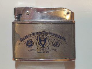 1950’s Flat Lighter - Atlantic Mutual Fire Insurance Co.  Of Savanah - Neat Graphics