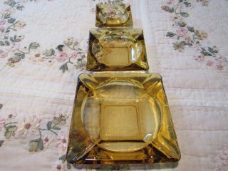 Vintage Glass Three Piece Ash Tray Yellow Gold 3.  5,  4.  5 & 6 In.