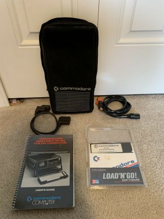 Commodore Color Sx 64 User Guide/5.  25 Test Demo Disks/keyboard Cable/pouch