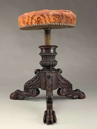 Very Early 19th Century Carved Walnut Paw Footed & Upholstered Piano Stool.