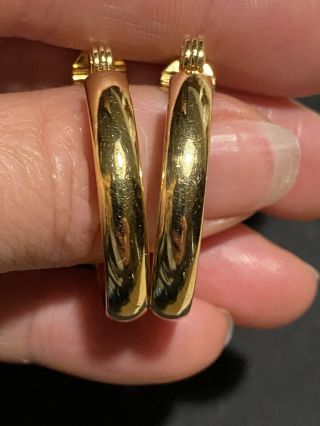 Vintage Monet Signed Gold Tone Hoop Clip On Earrings.