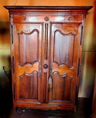 19th Century French Armoire,  Walnut,  Braided Top With Star Motif